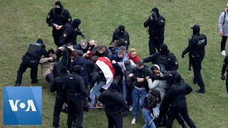 Black-Clad Masked Police Disperse Demonstrators at Belarus Protest