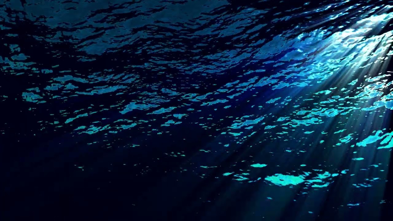 4k Underwater ocean waves ripple and flow with light rays