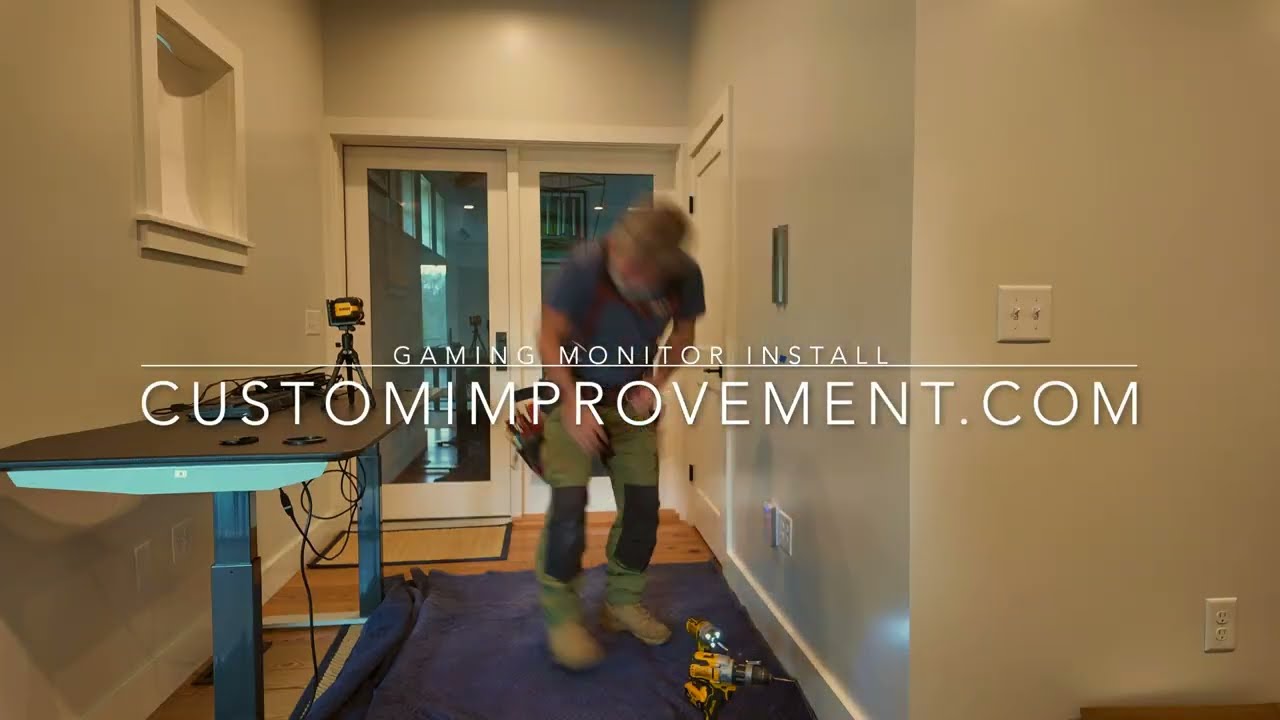 A computer monitor install with an articulating mount.