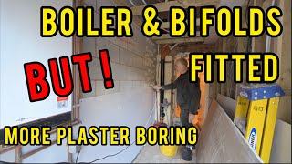 Boiler, Plaster boarding and Bi Fold doors installed