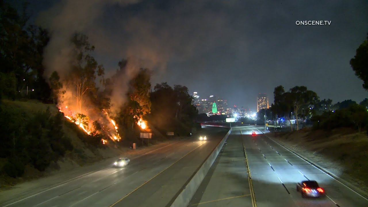 CHP Pursuit Passes By During Brush Fire On The Freeway In Boyle Heights ...