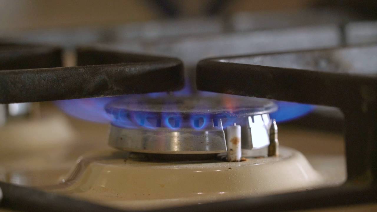 Lit Gas CloseUp Blue Flames Heated Metal Grate Gas Stove YouTube