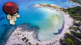 I found 2 Silver bracelets and a bag full of coins diving in one of the clearest beach in Greece