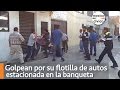 Golpean por su flotilla de autos estacionada en la banqueta | Poder Anti Gandalla