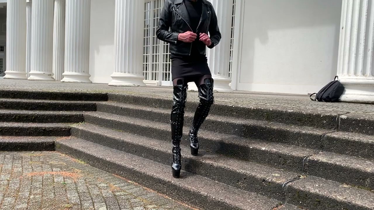 new biker jacket - crossdresser - thigh high pleaser boots - black leather biker jacket black dress