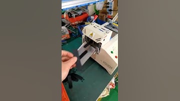 Automatic round cornered velcro tape cutting machine