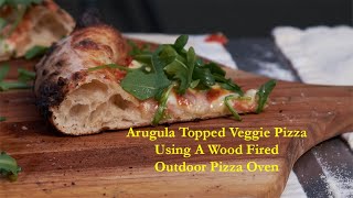 Wood Fired Veggie Pizza Topped With Arugula