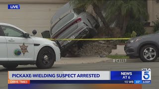 Pickaxe wielding suspect taken into custody in Orange County