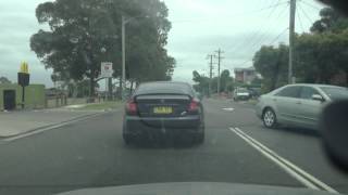 Idiot Toyota Driver Almost Gets T-Boned By A Holden ! FAIL !