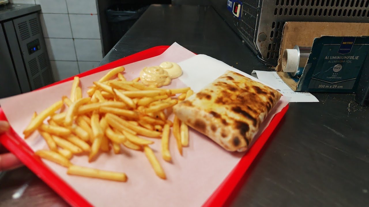 A Tacos with a French kebab sandwich 