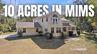 Tour This 10-Acre Country Escape in Mims, FL | Workshop, Wraparound Porch, Stocked Pond & More!