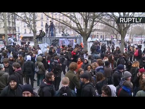 Clashes break out in Paris during rally against Macron’s public sector reforms