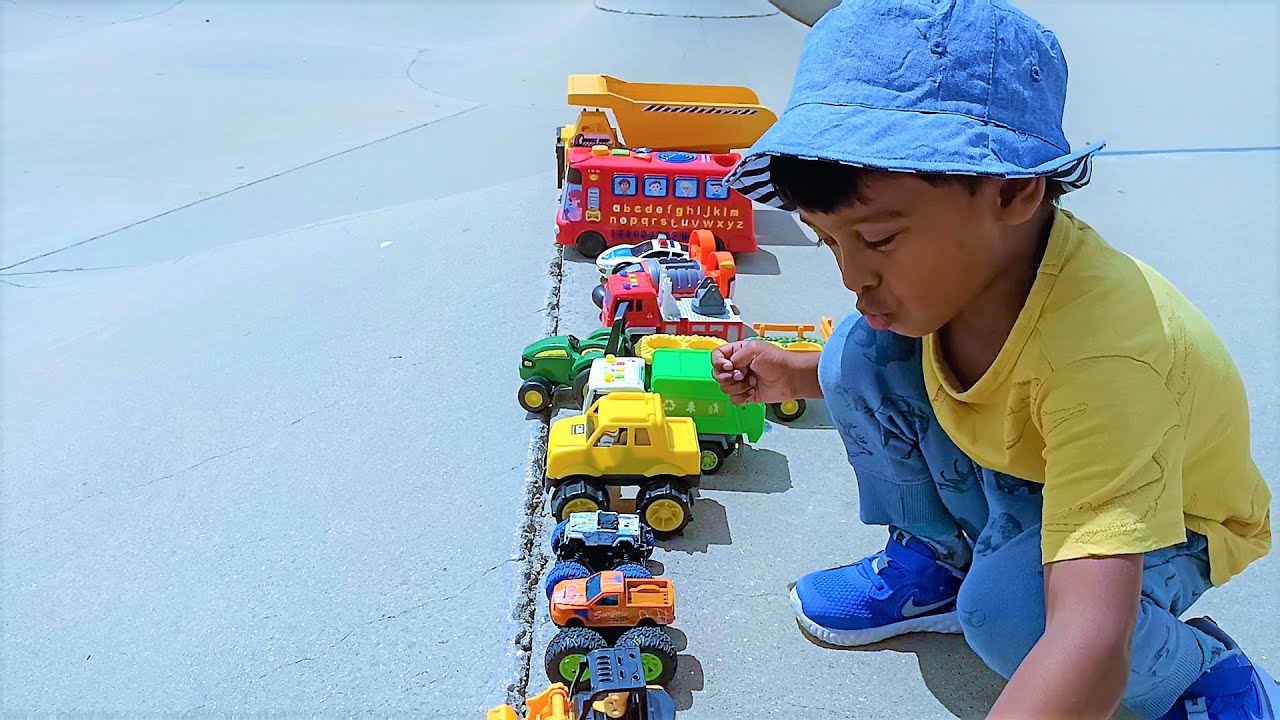Playing and sliding model toy car on ramp at skate park Cars and