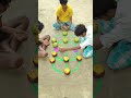 Two brothers play with Pumpkin Fruits and Palmyra Fruits.