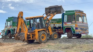 JCB 3DX Loading Small Stone in Double Ashock Leyland Truck for Making New Railway Track