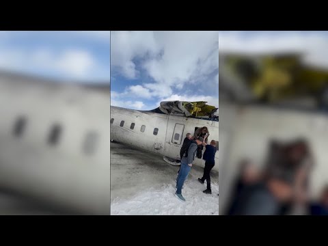 Toronto plane crash: Passenger describes scene inside jet after landing - All 80 people onboard survived after the plane flipped over when it landed in Toronto from Minneapolis.