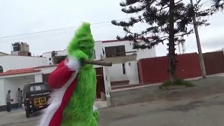 Police officer dressed as the 'Grinch' makes a Christmas drug bust