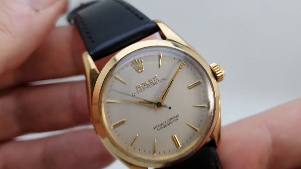 Rolex Oyster Perpetual in 9k gold RWC case. Model reference 6564 YouTube