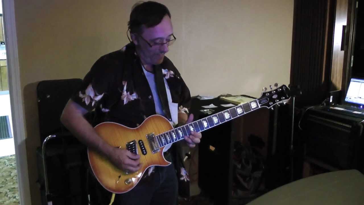 Doug Hamilton plays "Samba Pa Ti" on his guitar at the Elks Club