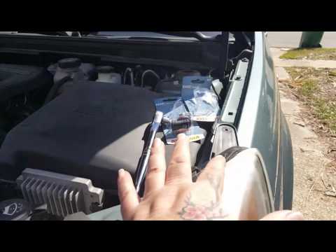 2009 saturn aura headlight bulb replacement