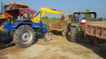 JCB Backhoe Machine Cutting Mud & Lading On SONALIKA Di 47 RX Trac-JCB Working For Road Construction