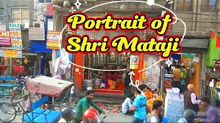 A Portrait Of Shri Mataji Was Hung In Front Of The Sahaja Yoga Program.