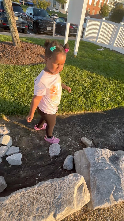 Collecting rocks at the national harbor