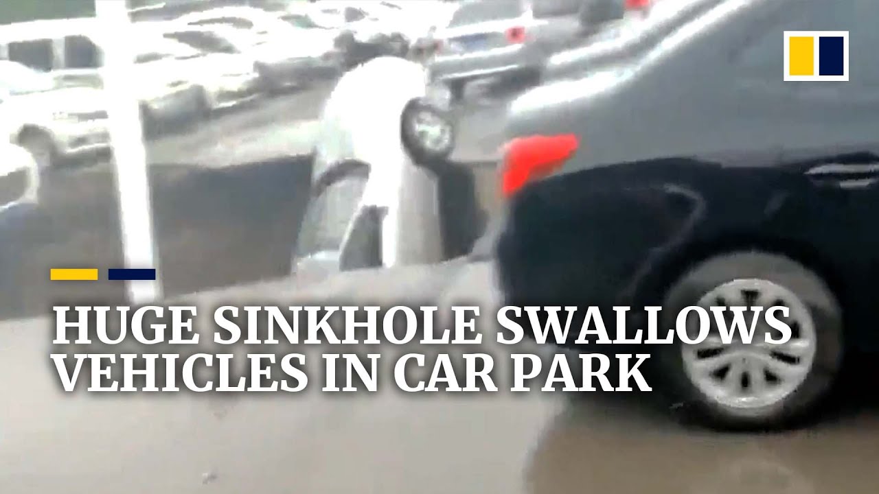 Huge sinkhole swallows vehicles in car park in China