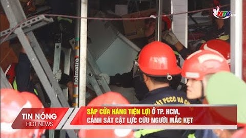 Sập cửa hàng tiện lợi ở TP. HCM, cảnh sát cật lực cứu người mắc kẹt