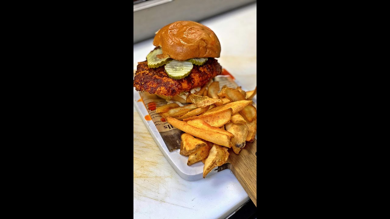 Nashville Hot Chicken Sandwich! 🥵🍗🔥Brioche Bun, homemade coleslaw tossed in spicy mayo ,dill pickles