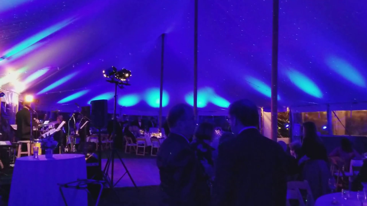 Uplighting and Starry Night projection in a 105'x45' tent