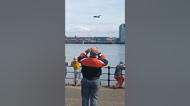 military planes low flight show off over Mersey river by Liverpool