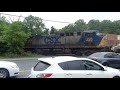 YN2 CSX 231 Leads an autorack train in Rockville 5/5/2024