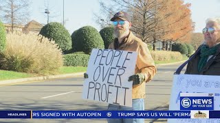 Protesters urge Black Friday shoppers in Knoxville to support local businesses