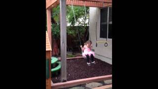 Extended the arbor, added rubber mulch and moved her playhouse.