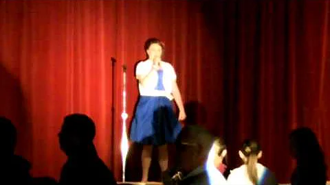Allison Metcalf singing The National Anthem in the...