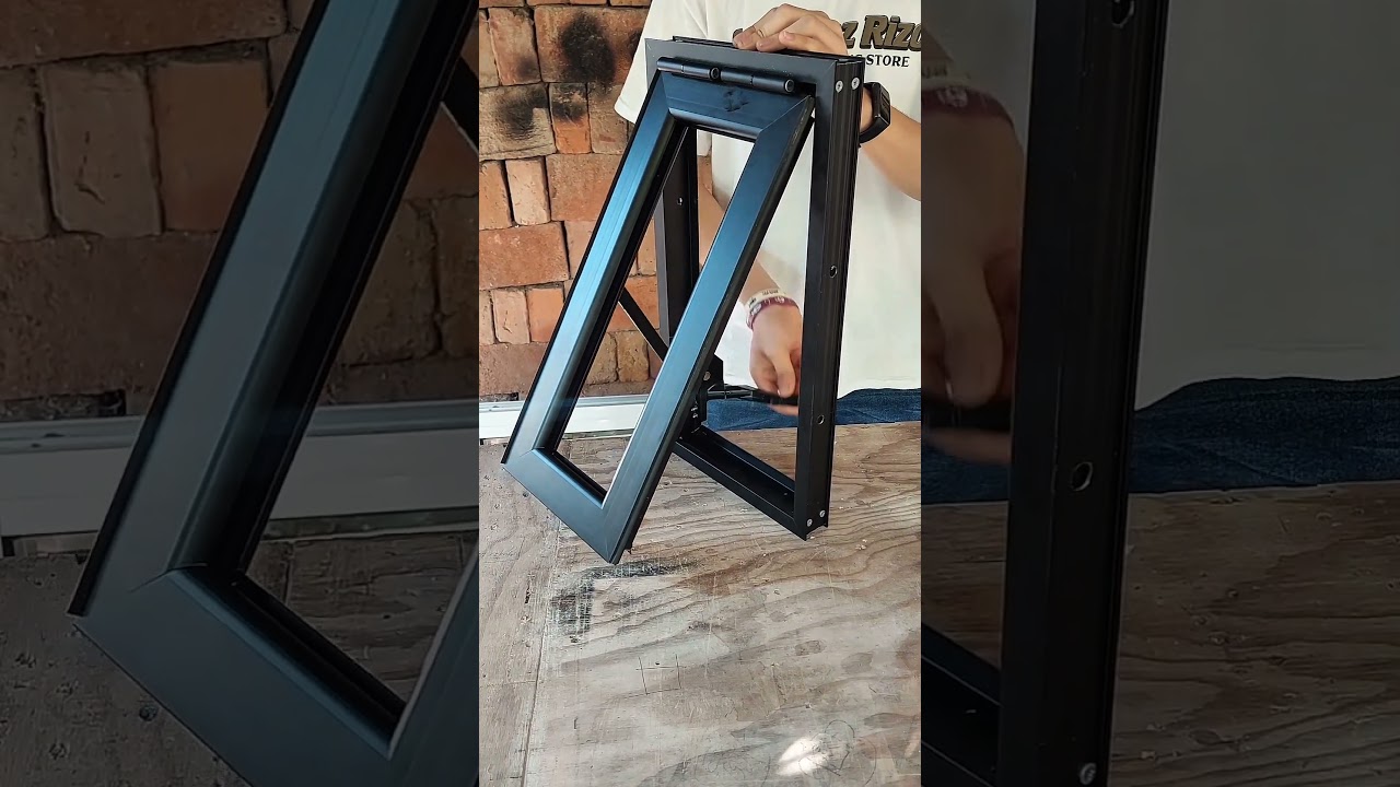 Ventana proyección S.35 aluminio color negro vidrio satinado  6 milímetros  