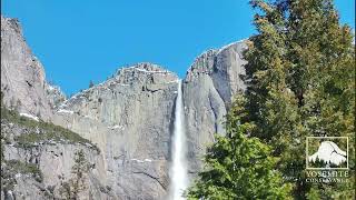 Stunning look at a bright and sunny Yosemite Falls in California