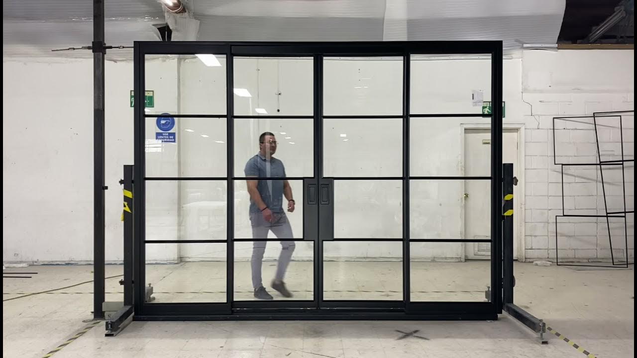 Interior Decor Idea | Black Framed Glass Wall with Sliding Doors