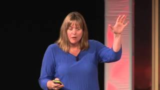 Pluto Revealed | Cathy Olkin | TEDxDetroit