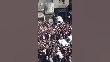 Drone footage shows Palestinian prisoners released by Israel arriving at Gaza