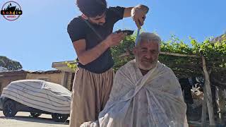 Nomadic life: Shaving the father's hair