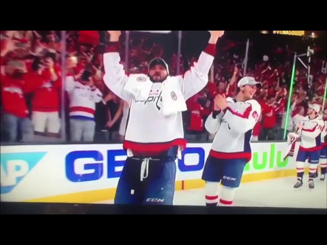 Female fan flashes Capitals during Stanley Cup celebration