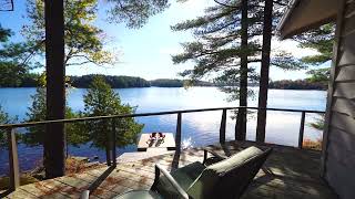 4 season cottage/road. Western exposure point of land, with 353 feet of panoramic views