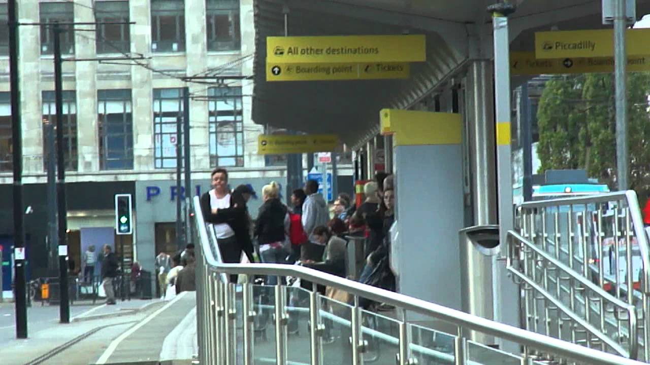 Electric trams + Mobile Bicycle Sound system passing at 3 minutes 32 seconds on Piccadilly