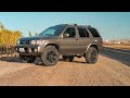 Lifting a 02 Nissan Pathfinder | KYB Excel-G struts + AC coils, Landrover Defender coils + Bilstein