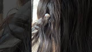 Bird Getting Cozy in Owner's Hair