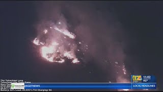 Firefighters work to contain brush fire near Tehachapi Loop