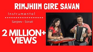 A very soulful song of r.d. burman, that was sung beautifully by
kishore kumar has now been played wonderfully sonali nath on hawaiian
guitar and sanjeev ...