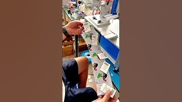 Labels feeding and tagging system.